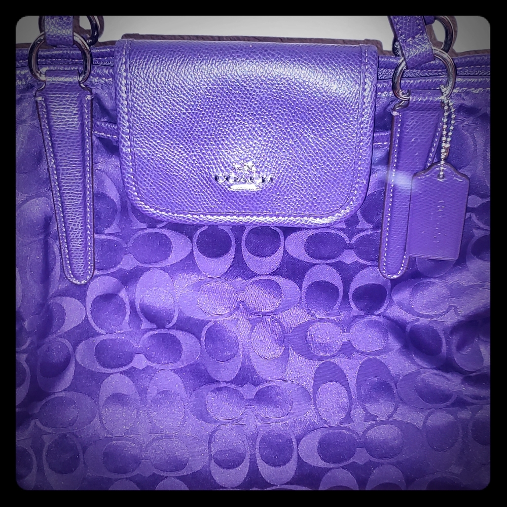 Beautiful purple coach purse.